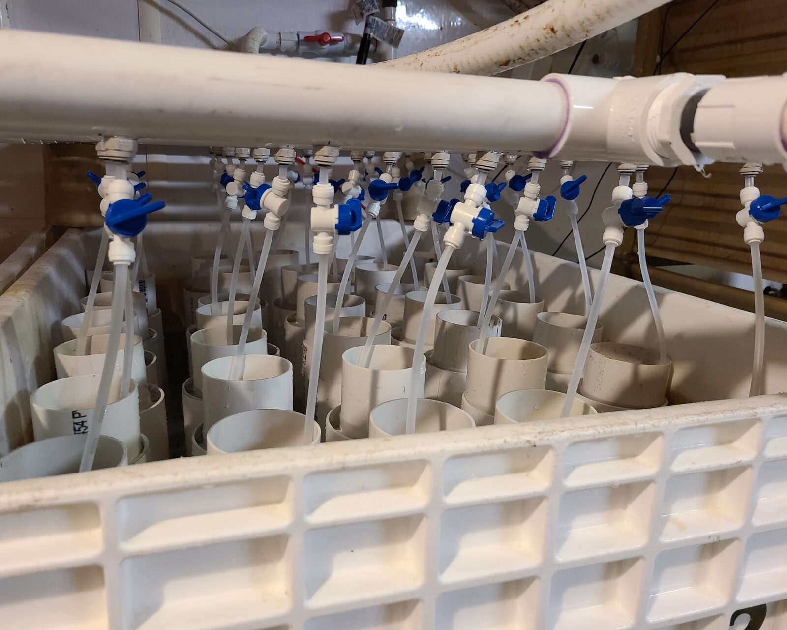 Side view of the water manifold with push-to-connect fittings